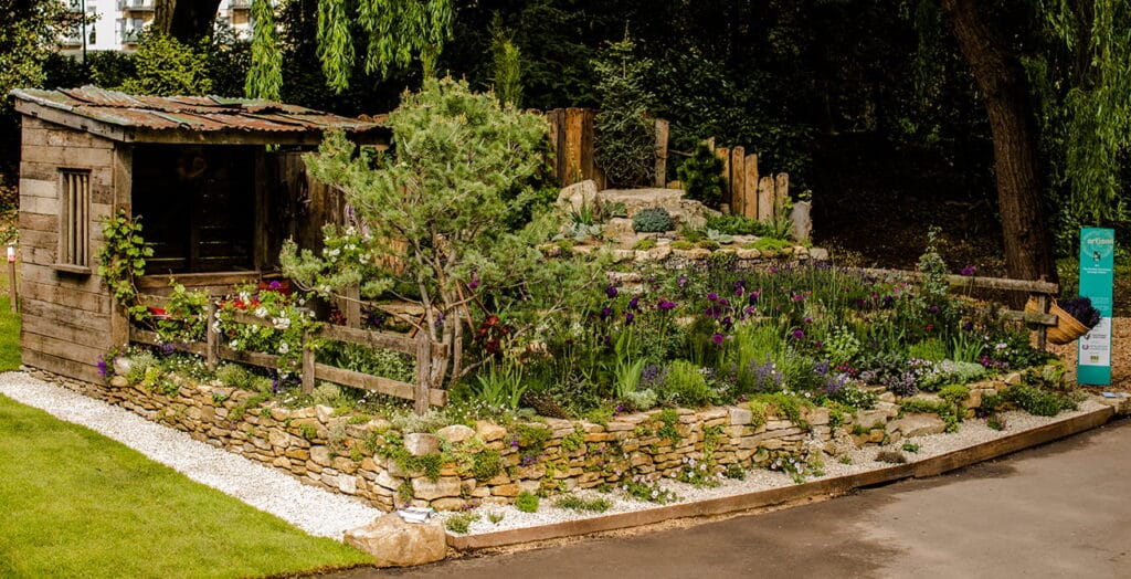 An image of Donkeys Matter built by Frogheath Landscapes for the Chelsea Flower Show in 2019.